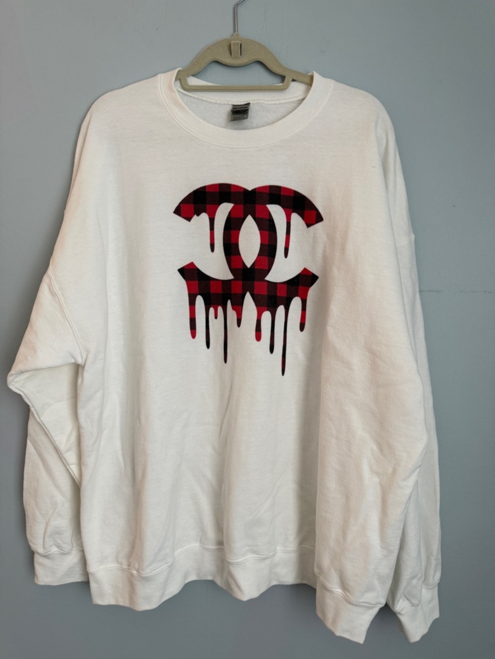 Gildan White Crewneck Sweatshirt with Red and Black Plaid Drip Graphic